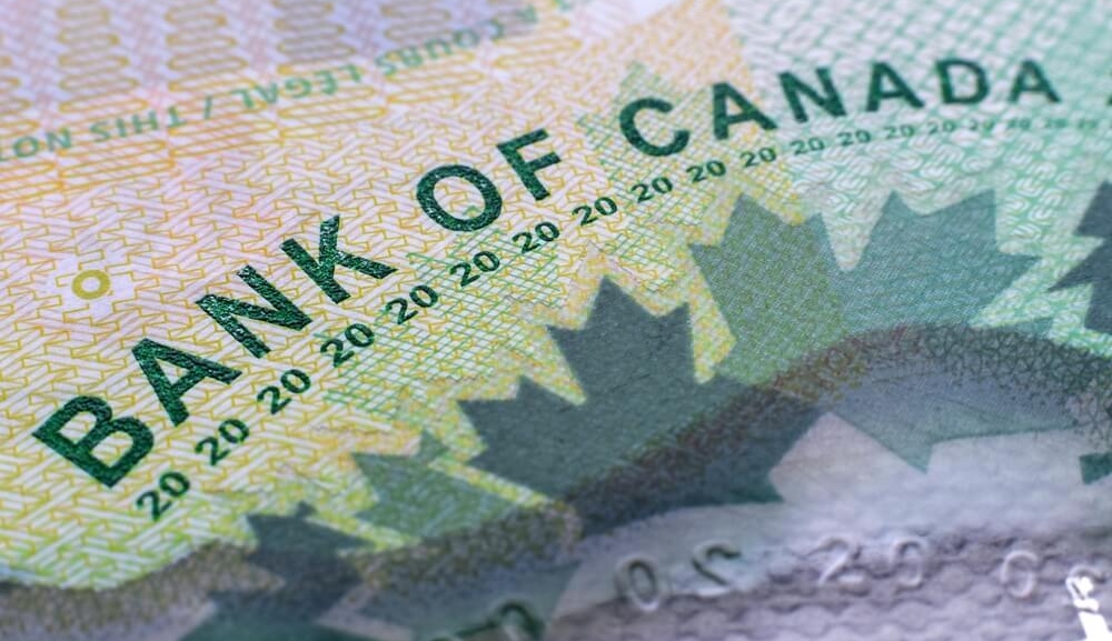 Closeup macro Bank of Canada words on a green 20 dollar Canadian money bill.jpg