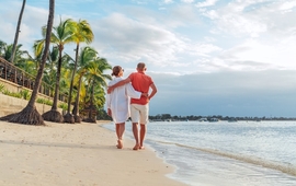 Couple in love hugging while walking on a sandy exotic beach. (1).jpg