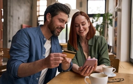 couple looking at credit card programs on laptop (1).jpg