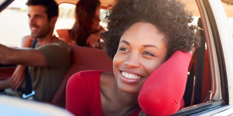 group of friends having fun in a car_cheapest and best cars to insure.jpg