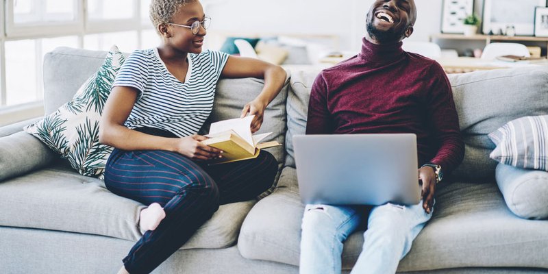 Happy couple in modern living room